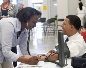 Nurse taking a patients blood pressure